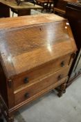 An early 20th Century golden oak bureau