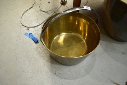 A traditional brass jam pan, highly polished