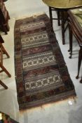 A traditional fireside or similar rug or runner, approx. 160 x 60cm