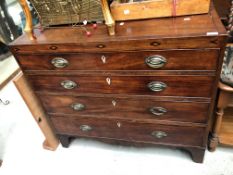 A 19th Century mahogany and inlaud chest of four long drawers, width approx 95cm