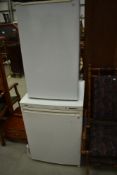 A Bosch LogiXX easy access fridge, door catch broken and an unbranded under counter fridge