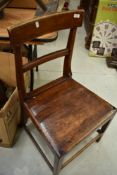 A 19th Century railback kitchen or dining chair having rail back
