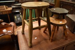 Three traditional milking or similar stools