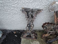 A set of cast iron table ends or supports