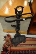 A reproduction cast stick stand