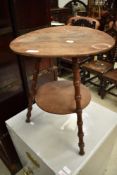 A Victorian stained frame tripod table having circular top and undertier , with simulated bamboo