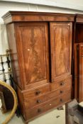 A 19TH Century mahogany linen press with two over two drawer base, some damage to back leg but