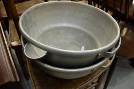 A pair of vintage aluminium grain or feed buckets