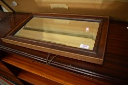 An oak framed wall mirror, approx. 53 x 30cm