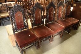 A set of five 19th Century Carolean revival dining chairs having upholstered seats and backs and