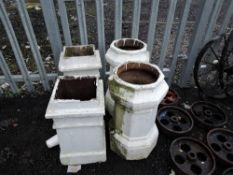 A selection of four chimney pots