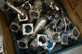 A crate of light fittings, mini Par Can style, some with coloured gels