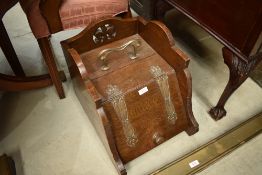 A Victorian oak coal purdonium having Art Nouveau style hinges and handles