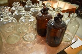 A selection of glass demijohns