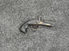 A reproduction Derringer Pistol marked Derringer Philadelphia