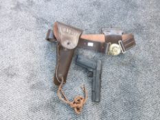 A leather US Army Holster & Belt with ammunition pouch with a reproduction US Army 45 Pistol