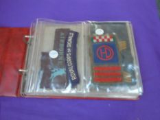An album of Military Cloth Badges including Airbourne, Civil Defence, Signals, German Minefield etc,