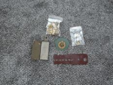 A WW1 Trench Mirror, RAF Buttons, RAF Cap Badge, 1952 Bakelite Button Cleaner and a Military Belt