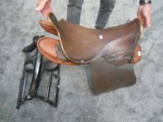 A possible WW1 Military Saddle on later metal wall bracket