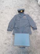 A RAF Cap with badge, RAF Jacket and Trousers with VR badges and cloth RAF badge and buttons dated