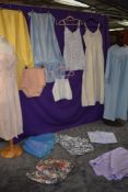 A good mixed lot of vintage, retro and antique lingerie including slips and petticoats, nightdresses