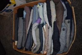 A box full of gents vintage trousers, a lot having button fly, varied sizes, around 1930s onwards.
