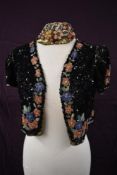 A beautiful 1930s richly sequinned and beaded jacket with short sleeves and matching cap,a variety