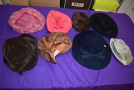 A mixture of vintage hats,various eras and styles.