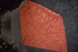 A Large and heavy antique paisley quilt, vibrant colours and in good order.