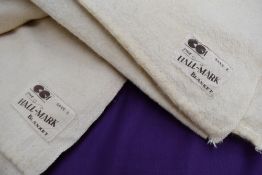 A pair of CC41 labelled cream wool utility blankets.