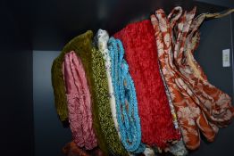 An assortment of vintage curtains and cushion covers, predominantly around 1940s to 1960s.