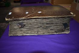 A superb piece of history in the form of a scrapbook, this contains a massive array of fabric