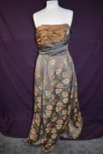 A beautiful 1950s strapless gown, Jean Allen for Cresta, in bronze and taupe tones with gathers to