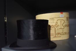 A vintage top hat 'A.Pellet, Haworth's buildings, cross street and royal exchange, 8 market