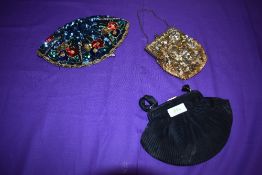 A 1930s French sequinned cap and two bags.