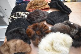 A large quantity of mixed fur hats including mink,fox and astrakhan, various styles and sizes.