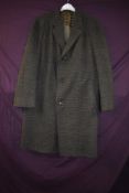 A gents Daks 1960s overcoat size 44R with Arnisons of Penrith label.