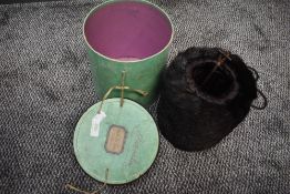 An antique beaver fur muff in original Parisian box.