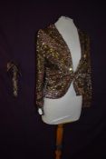 A wonderful 1930s gold,silver and bronze sequinned jacket with long sleeves, brilliant condition for