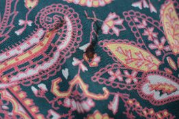 Two vintage dressing gowns including Tootal with bright paisley pattern.