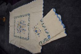Two vintage quilts having appliqué flora designs on cream ground.