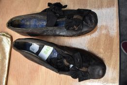 A pair of Victorian Childrens shoes with bow and beading detail to fronts.