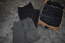 A box full of gents vintage trousers, a lot having button fly, varied sizes around 1930s onwards.