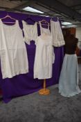 A collection of antique items amongst which are petticoats,camisoles and night dresses, including