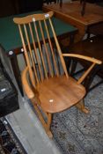 A beech rocker, probably Ercol though unmarked apart from a faint stamp