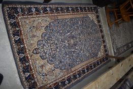 A traditional fireside rug, approx. 180 x 120cm