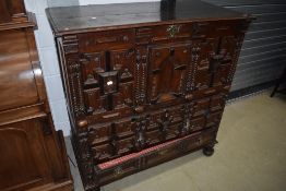 A 19th Century oak chest in the Jacobean style, possibly European/Low Countries, having lift top,