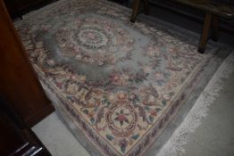 A modern Chinese carpet square, having jade green ground, approx. 280 x 183cm