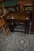 A part nest of two traditional oak occasional tables having turned legs