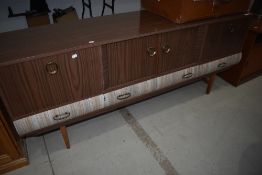 A vintage melamine/laminate long John style sideboard, width approx. 178cm